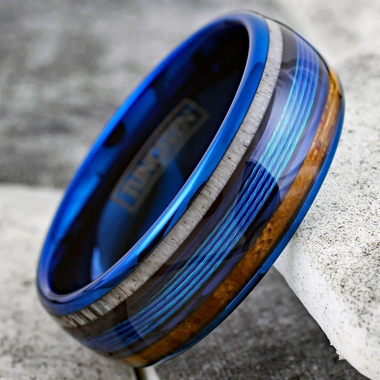 King's Cross Personalized Engraved 8mm Brilliant Blue Tungsten Carbide Low Dome Band Ring with Blue Fishing Line Between Whiskey Barrel Oak Wood and Deer Antler Inlays.